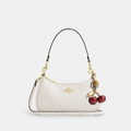 Coach Nolita Wristlet in white signature leather