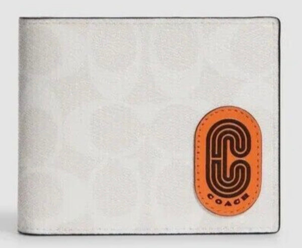 Coach Signature Canvas With Patch in a white and orange colorway