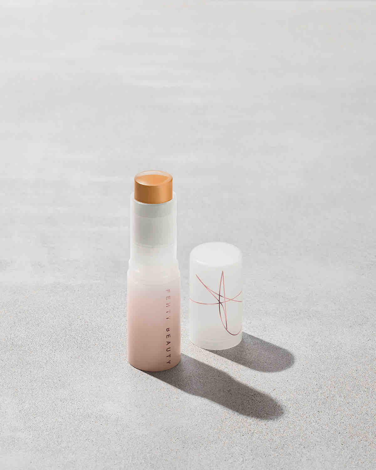 Fenty Beauty Eaze Drop Blur + Smooth Tint Stick — 14