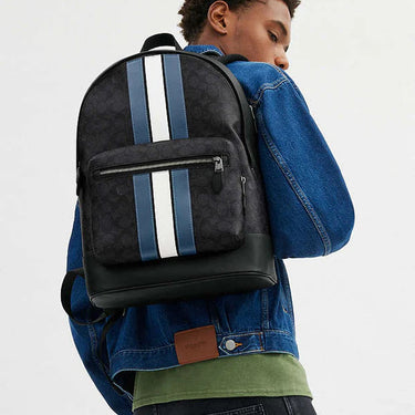 Coach West Backpack In Signature Canvas With Varsity Stripe Signature Canvas-Gunmetal-Charcoal-Denim-Chalk
